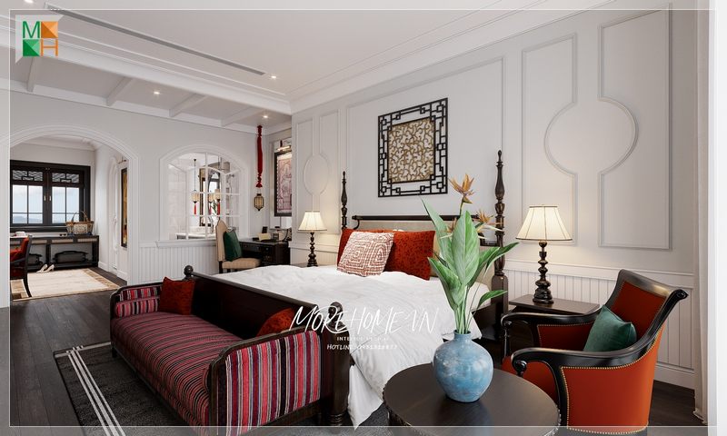 Nội thất phòng ngủ được thiết kế theo phong cách Indochine với tông màu đỏ của nỉ Bỉ kết hợp nội thất gỗ tự nhiên màu đen sang trọng