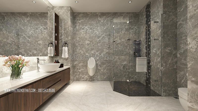 Sử dụng vách kính cường lực ngăn cách bởi không gian vệ sinh và phòng ngủ, tạo không gian thoáng rộng hơn.